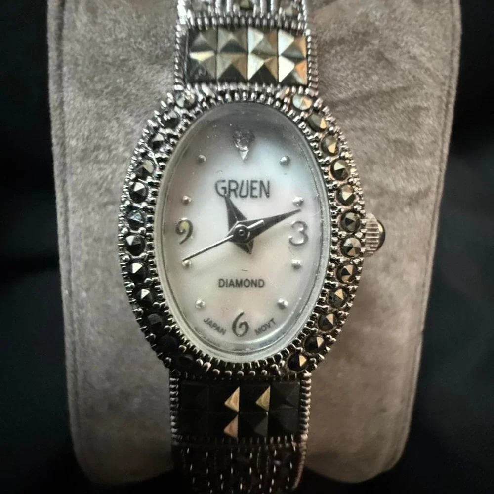 Gruen diamond watch with black and silver accents